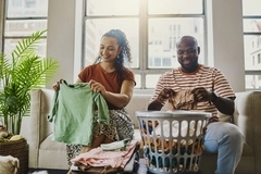 Image people folding laundry