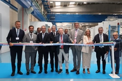 Image cutting ribbon at factory