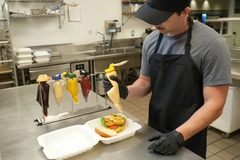 Image A person working with pouches