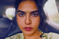 Image Indian woman sitting in her car