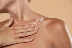 body cream on collarbone 