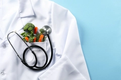 Vegetables inside a doctor's pocket Vegetables inside a doctor's pocket