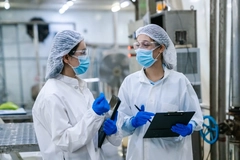 Image Two food innovators working in a lab.