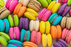 Image Brightly colored macaroons in a pile.