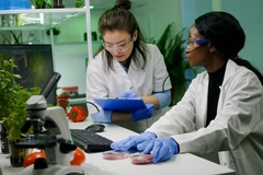two female scientists working in lab