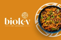 Image A picture with the image of noodles on a soft brown background with a company logo