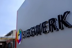 Image A logo of a company on a wall