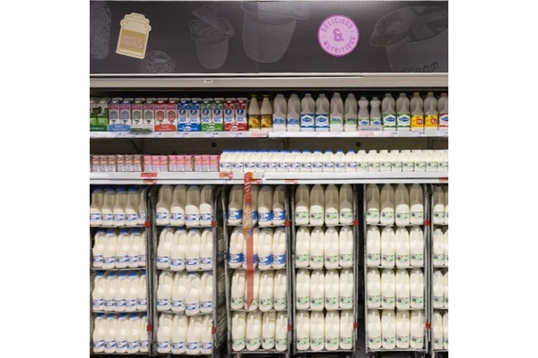 Milk on shelf.