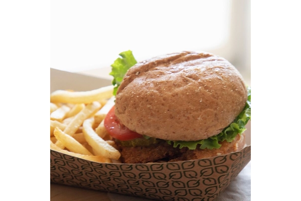 Image Burger and fries in compostable food packaging.