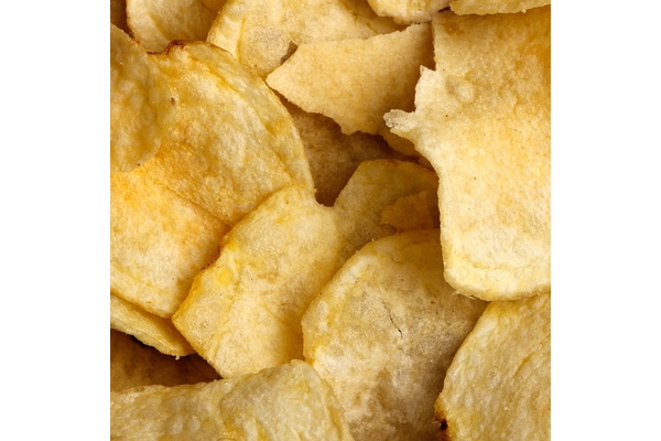Yellow potato chips are placed everywhere.