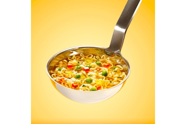 Noodles on a large spoon.