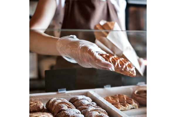 Image Person buying bakery products.