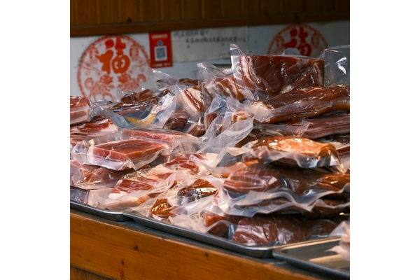 Image Preserved meat products are placed in a Chinese store.
