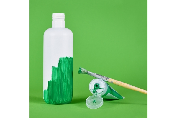Image green washing white plastic bottle