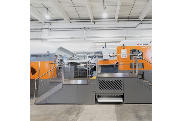 Image Packaging machine inside facility.