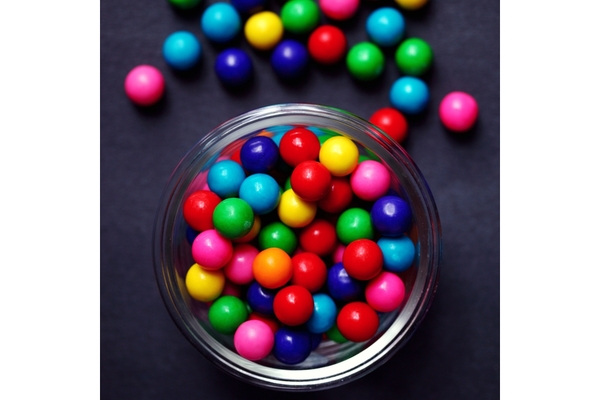 Image Colorful candies in a glass bowl.
