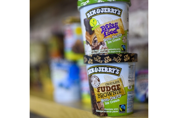 Image Two cups of ice creams are placed together.