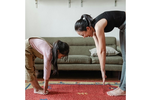 Image Two people exercising.