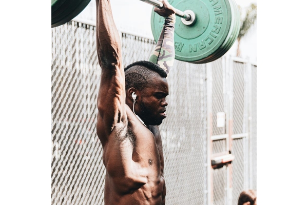 Man lifting weights at a gym