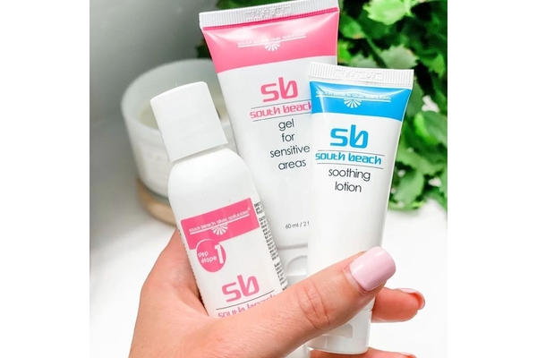 A hand holding South Beach Skin Solutions new range.