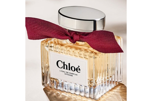 square perfume bottle with a bow