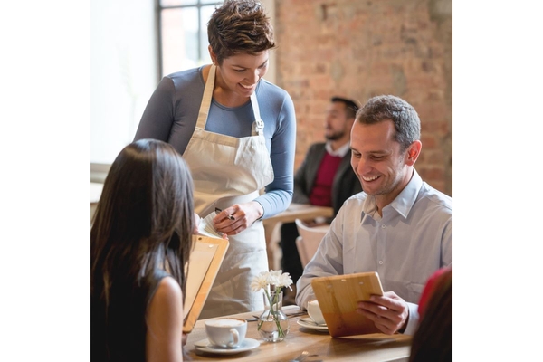 Image People ordering food from a menu without calorie labels.