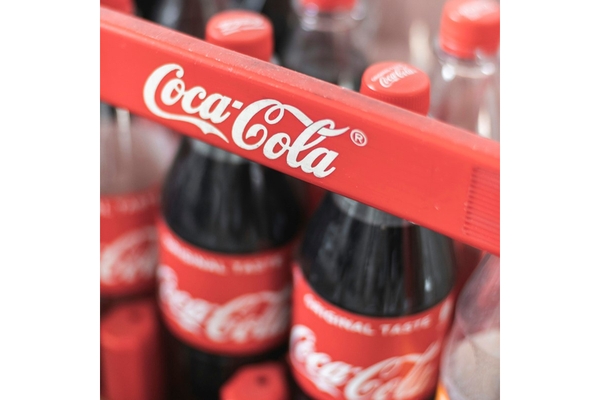Image Coca-Cola bottles.