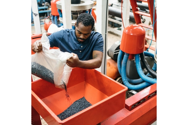 Image Man making plastics.