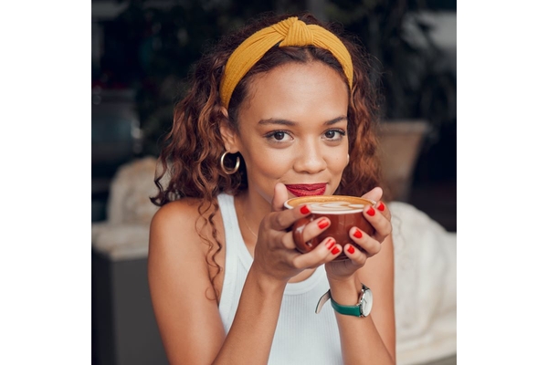 Woman drinks coffee