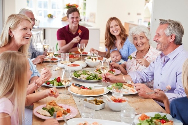 multi generation family eating lunch
