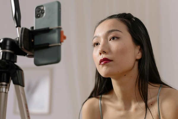 woman filming tiktok