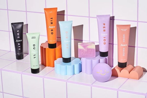 skin care products on a tile shelf