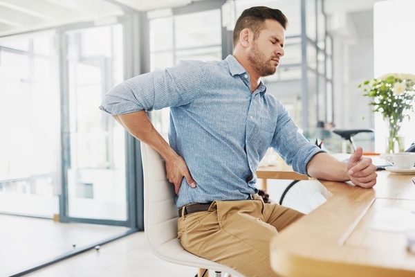 Man with severe back pain