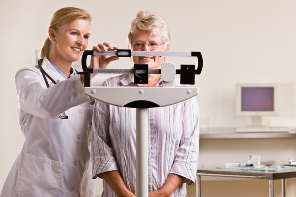 Woman happy she is losing weight