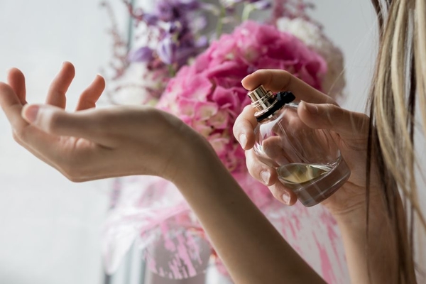 Image perfume sprayed on forearm