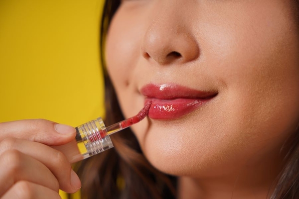 Image woman using lip makeup
