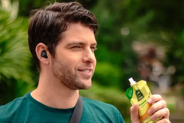 Image Man drinking from spouted pouch