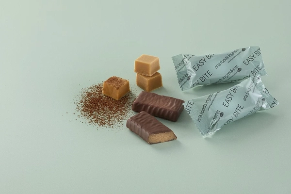 Image protein bars on aqua colored background