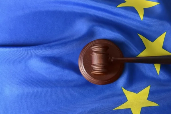 Image A gavel on top of the EU flag.