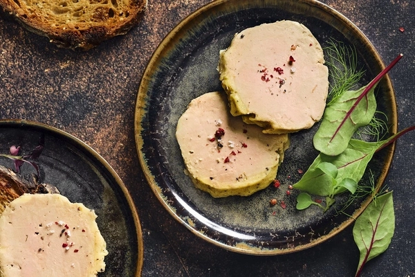 Image cultivated foie gras on brown plate