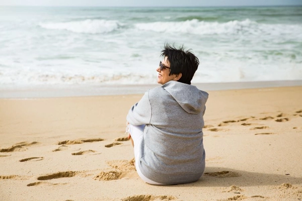Image Healthy woman in menopause at the beach