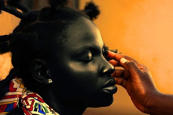 Image woman getting traditional makeup applied