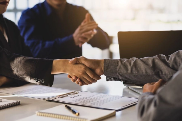 Business deal with contract signed