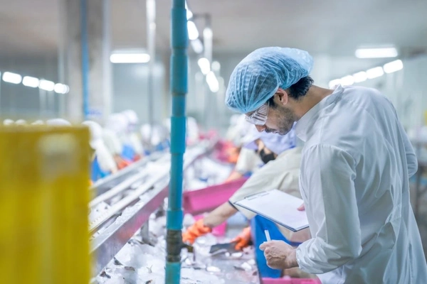 Man in a food lab