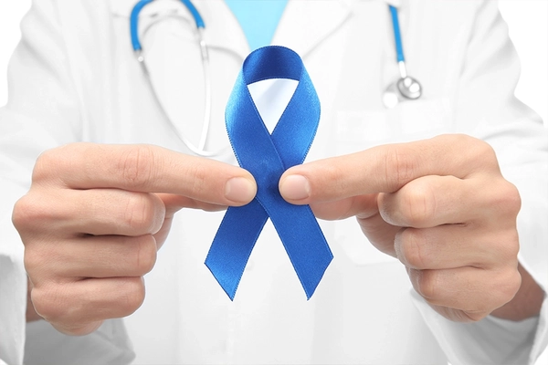 Image Doctor holding blue ribbon, closeup