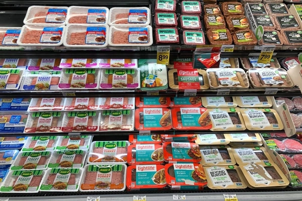 Image Plant-based meat on supermarket shelf.
