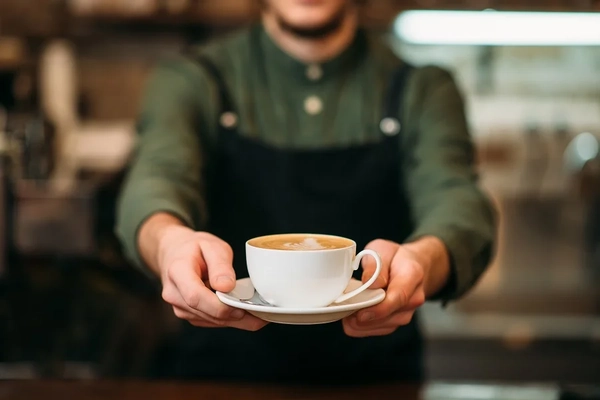 Man holding coffee cup