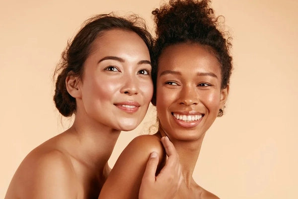 Two women with beautiful skin