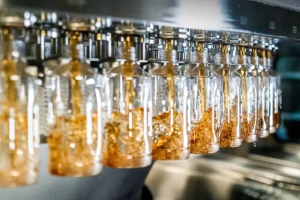 Image A group of bottles with brown liquid in them