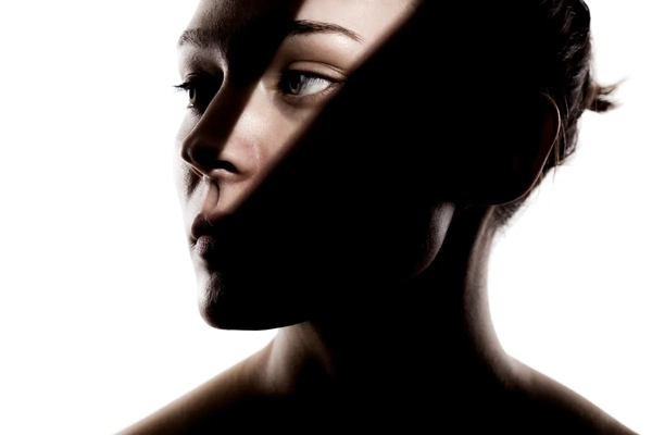 Image Woman with a shadow across her face